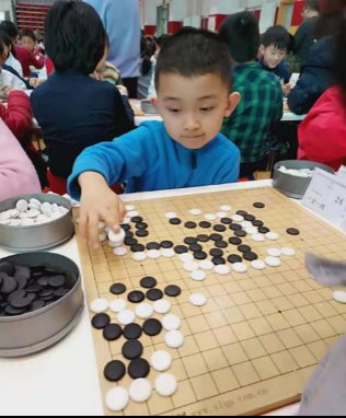 “潜伏”爱棋道的80后父亲